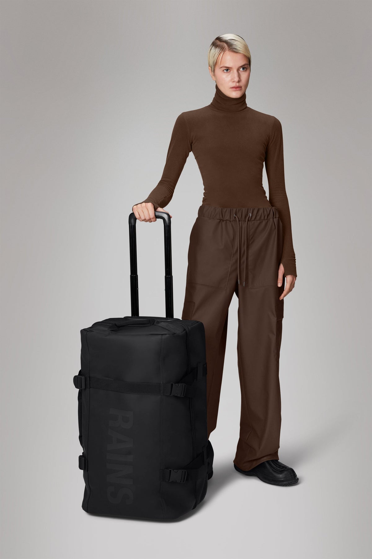 RAINS Texel Check-in Bag Black 62L H64 x D27 x W36 cm Trolley