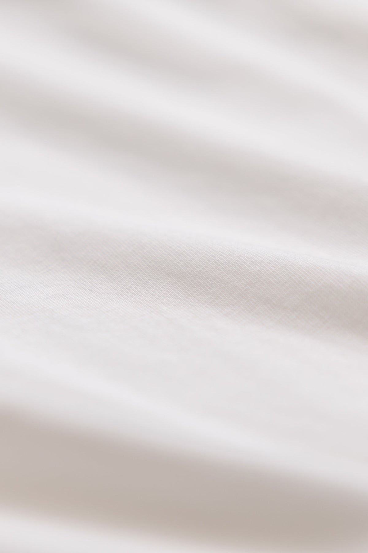 close up shot of white cotton t-shirt#color_white