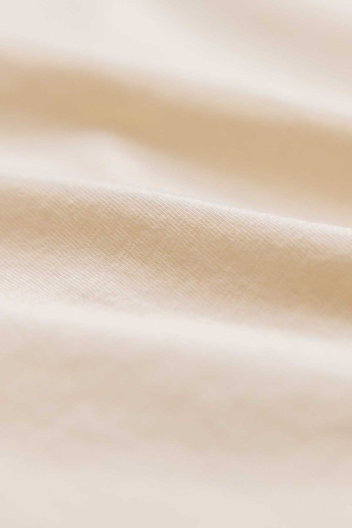 close up shot of natural color organic cotton t-shirt#color_natural