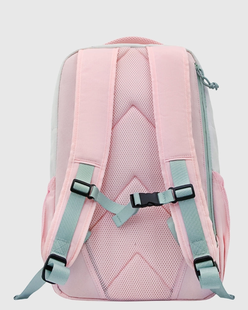 Pink backpack with gray straps on a light gray background