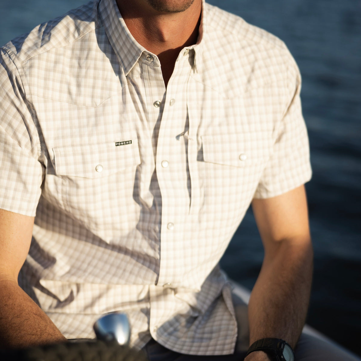 closeup of tan checkered shirt
