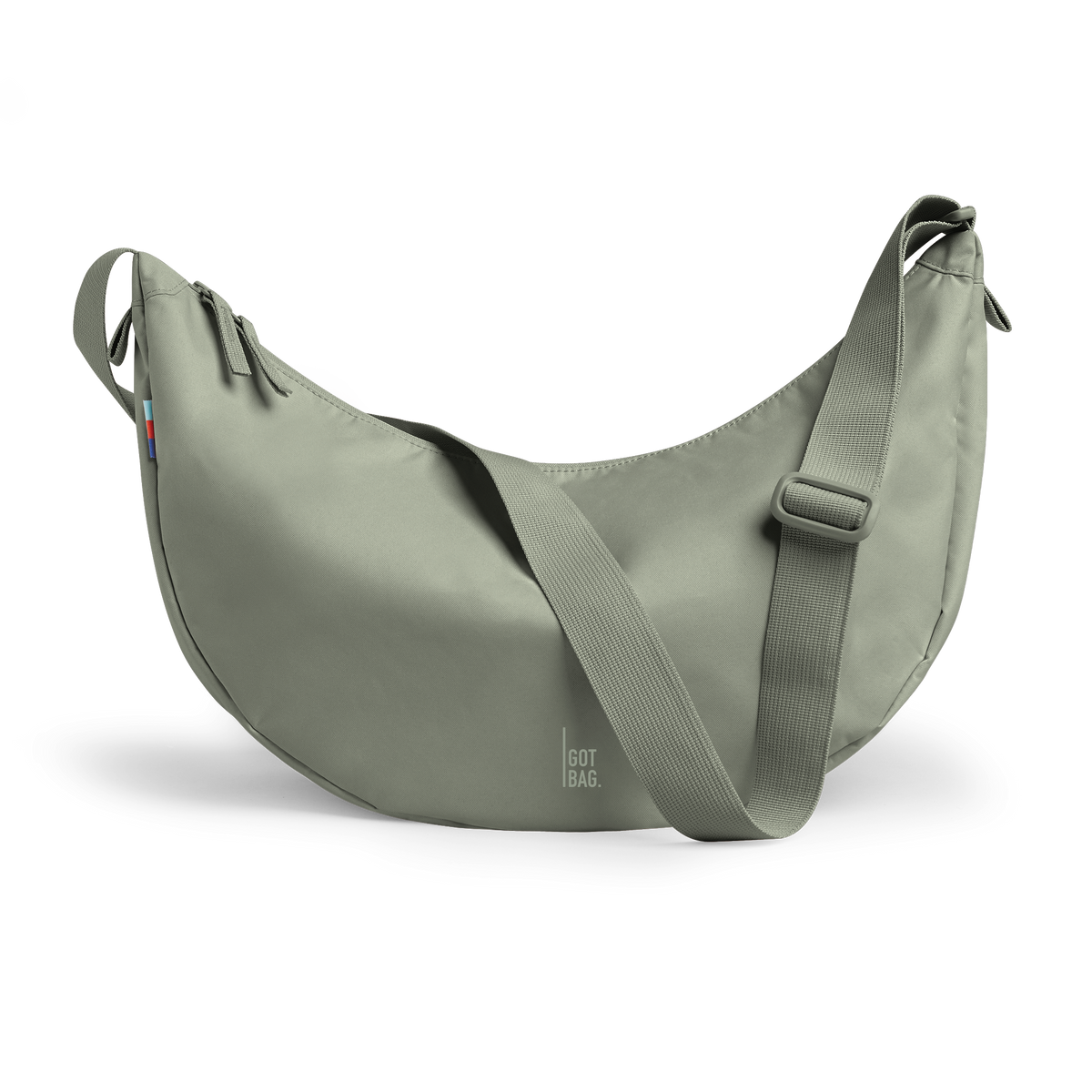 MOON BAG bag in bass (Sage Green), studio shot, front view.