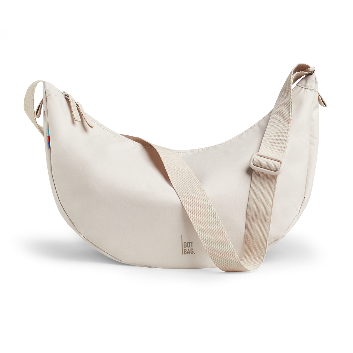 MOON BAG bag in soft shell (Warm Cream White), studio shot, front view.
