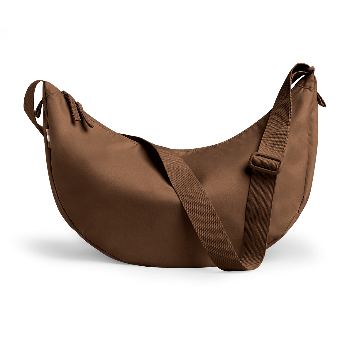 MOON BAG LARGE bag in trench (Warm Golden Brown), studio shot, front view.