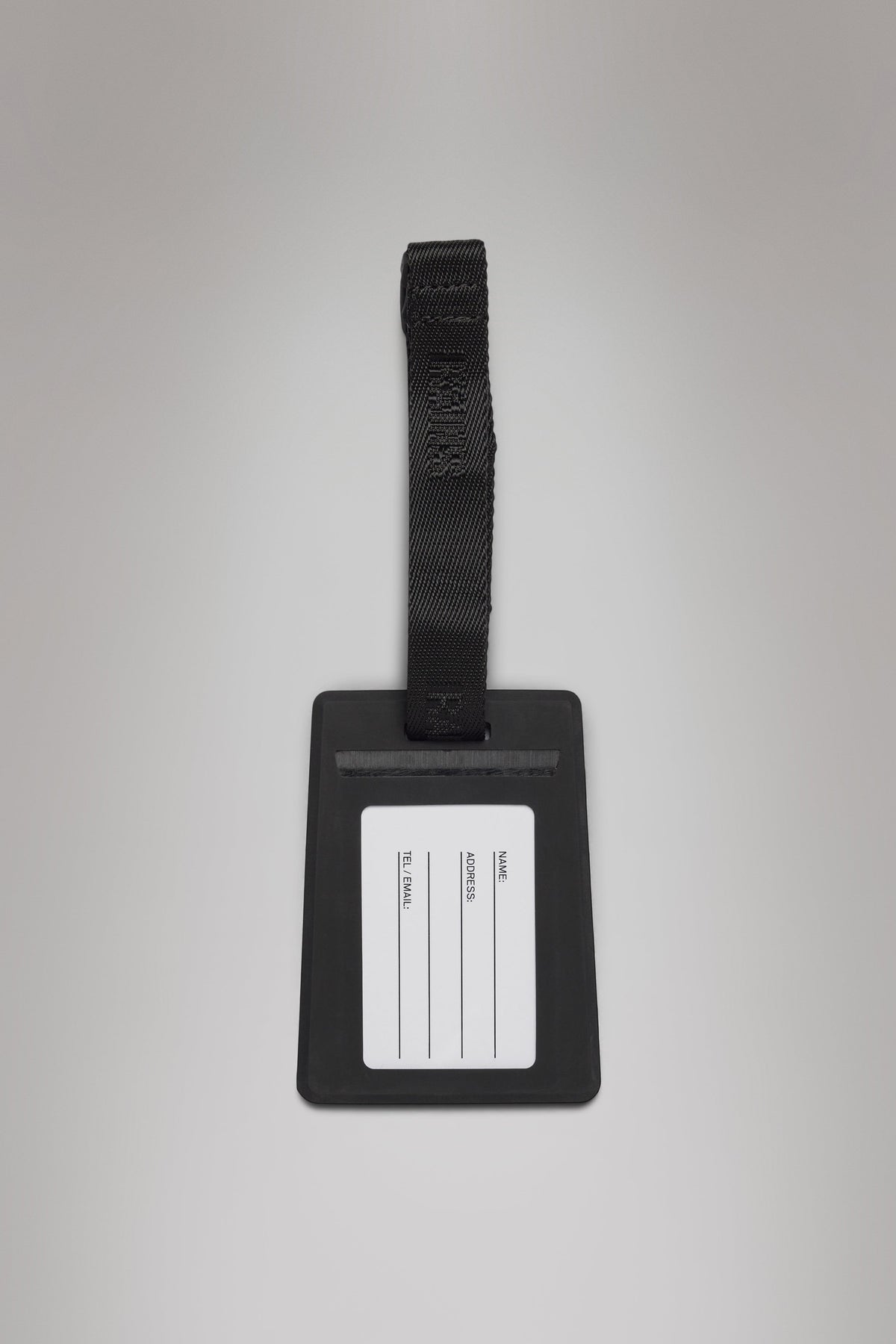 RAINS Travel Tag Black Lifestyle