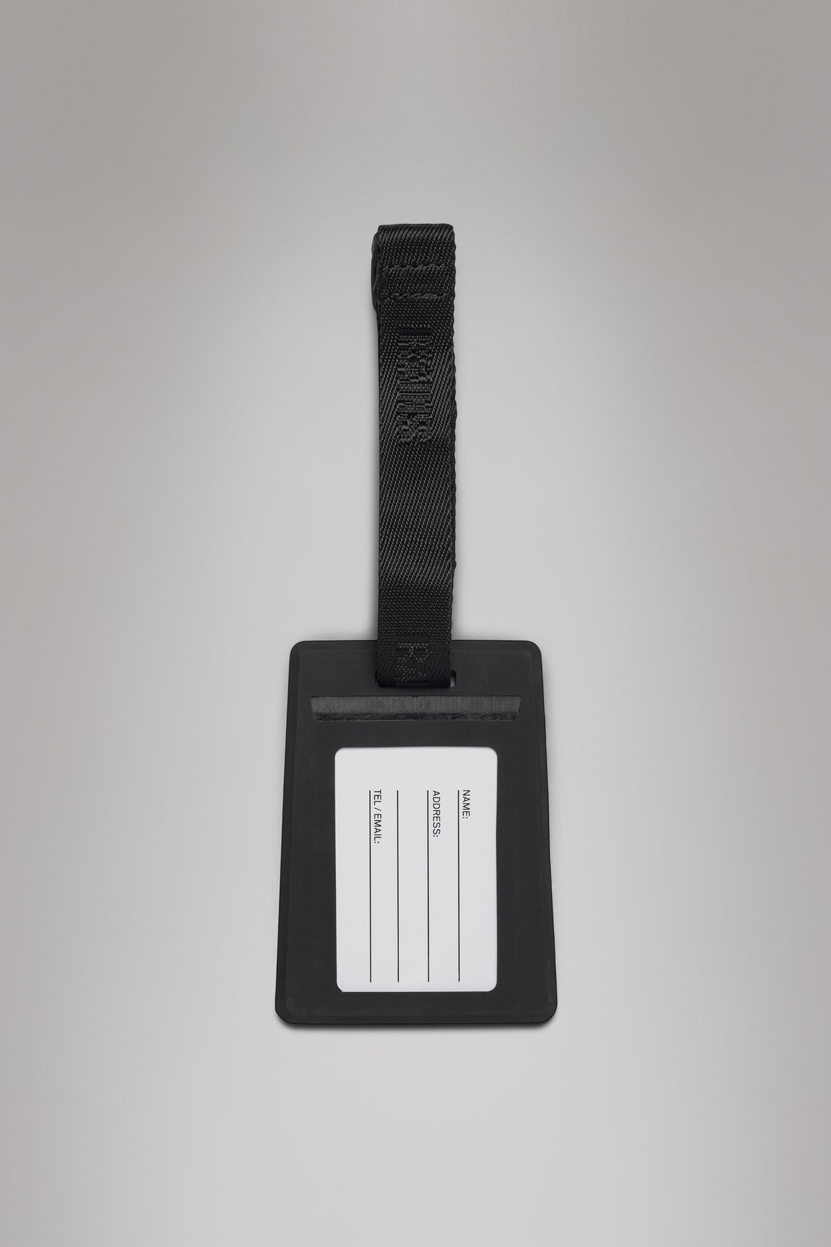 RAINS Travel Tag Black Lifestyle