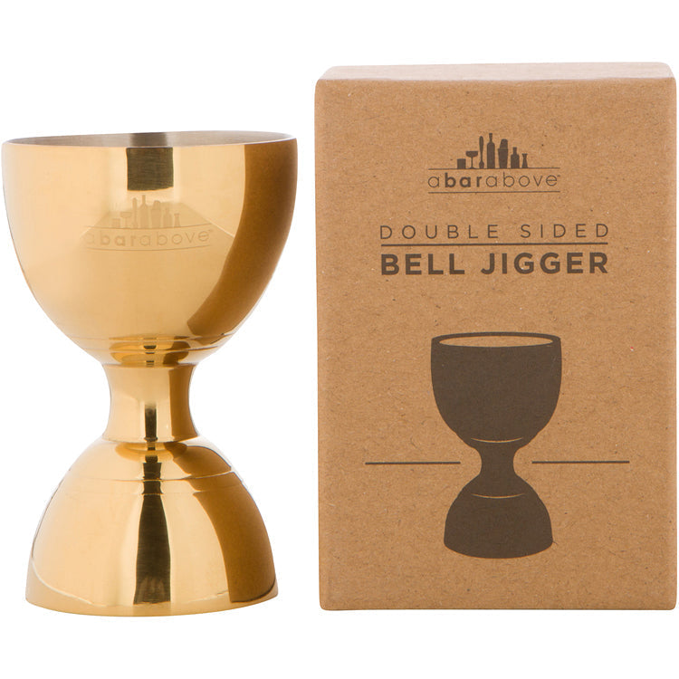 Gold bell jigger displayed alongside its brown product packaging, labeled "Double Sided Bell Jigger" (details in description).