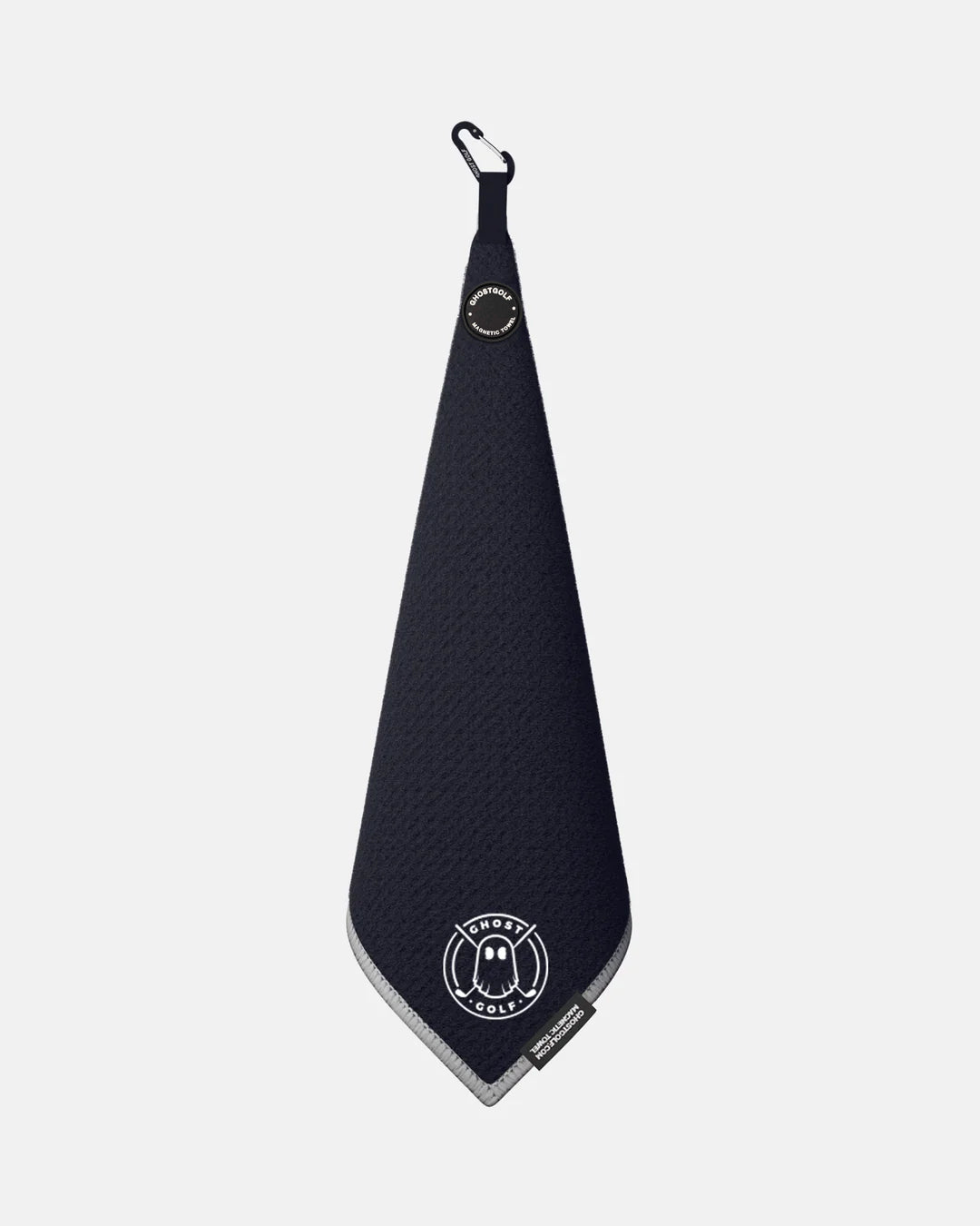 Product shot of Black Ghost Golf Magnetic Greenside Towel with emblem logo near the bottom and carabiner clip at the top #color_black