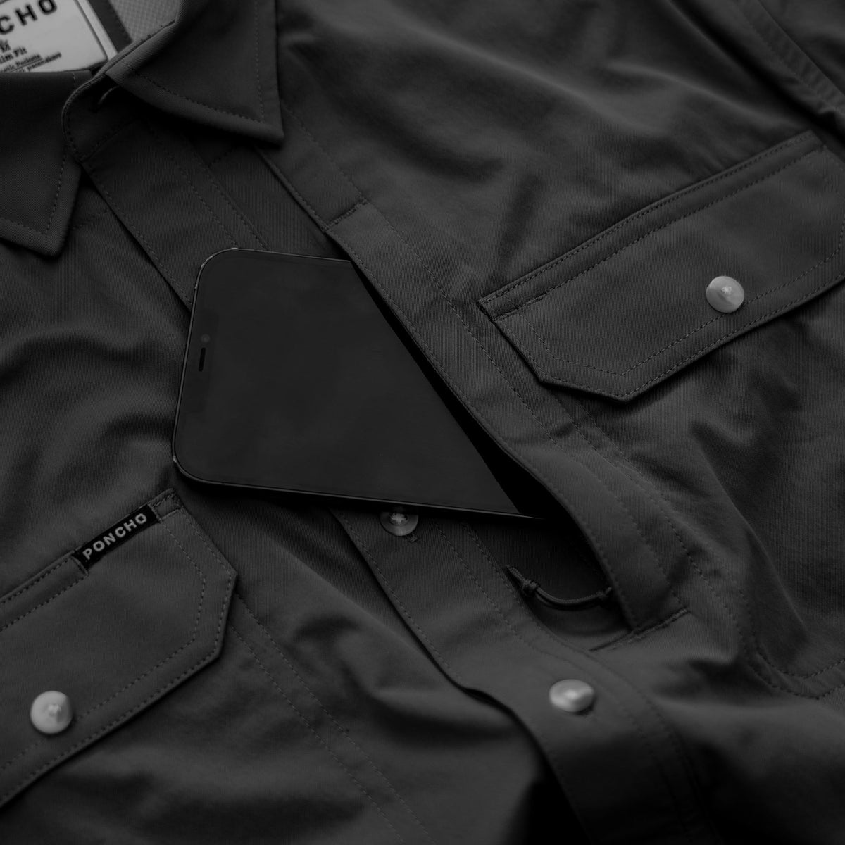 close up of zip pocket on chest of shirt
