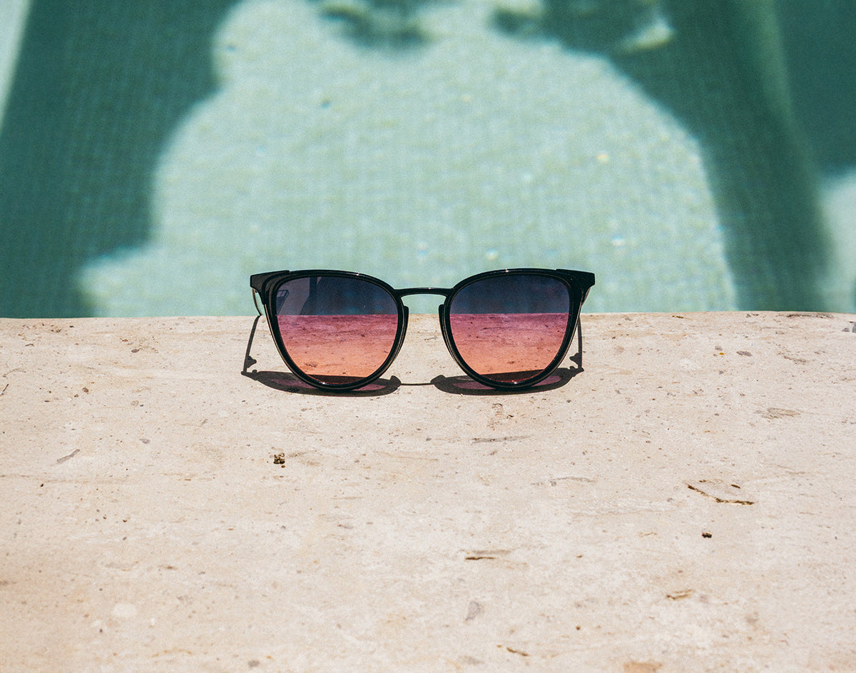 STORY sunski catalina sunglasses next to pool