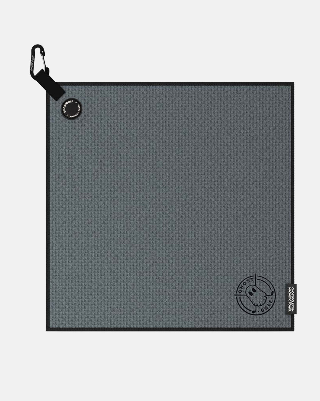 Product shot of Dark Grey Ghost Golf Magnetic Greenside Towel with emblem logo near the bottom and carabiner clip at the top #color_dark-grey