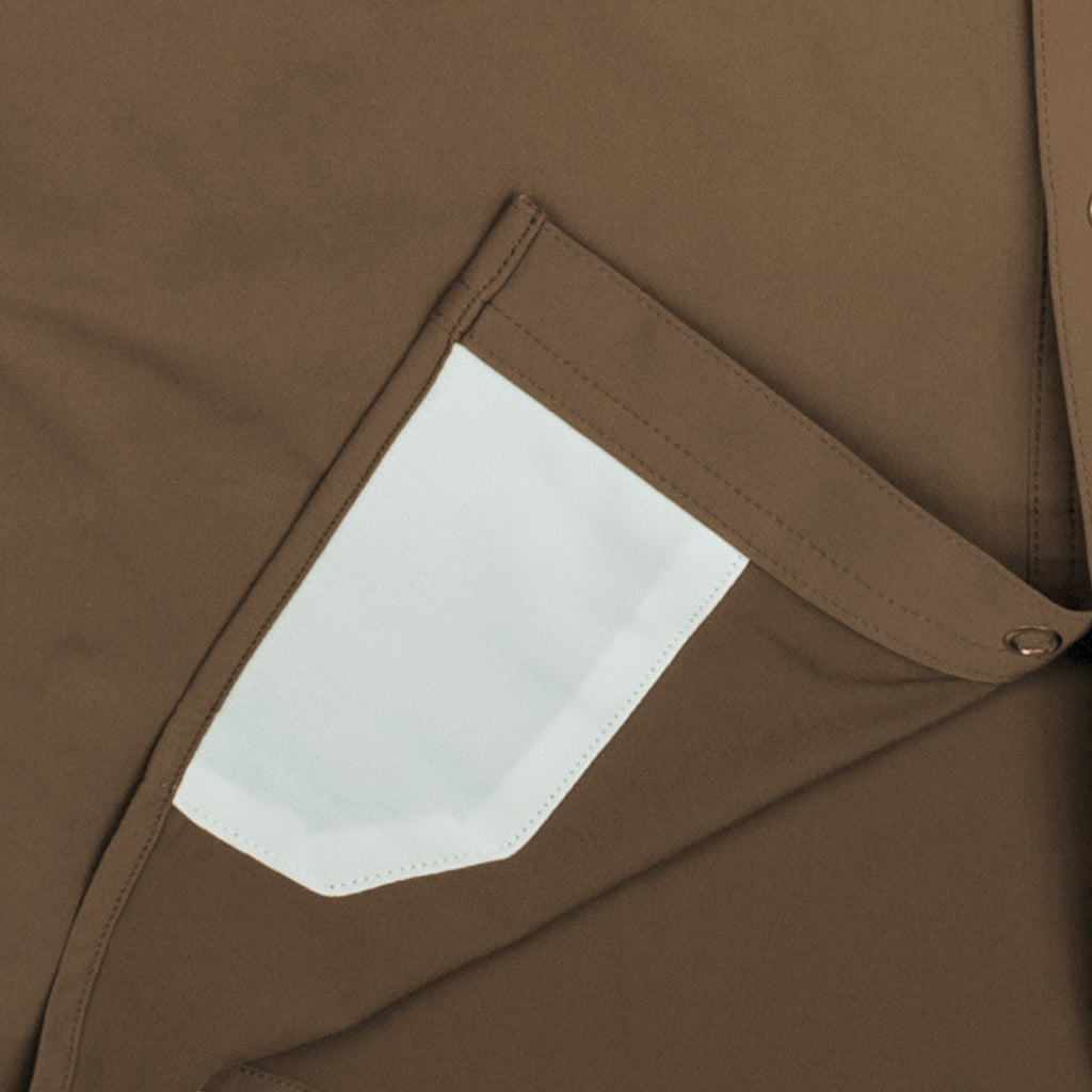 closeup of brown shirt sunglasses cleaner
