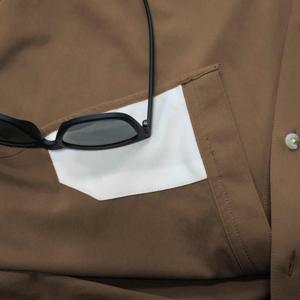 close up of sunglasses cleaner on shirt