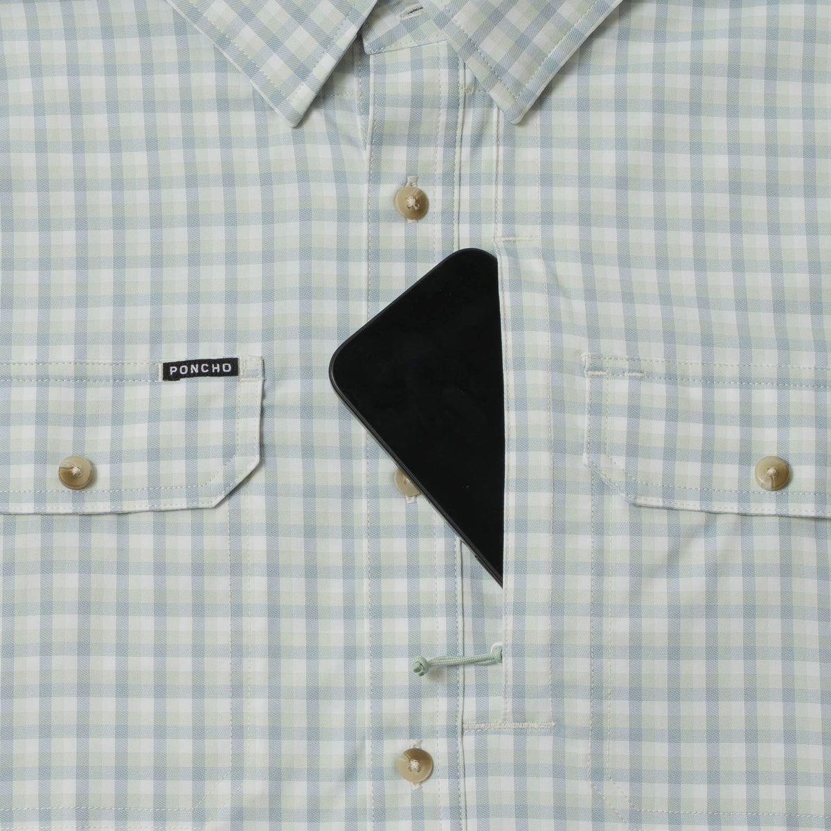 phone in chest zipper pocket of shirt
