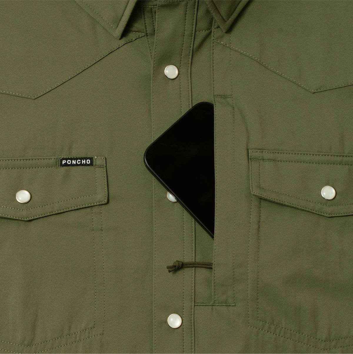 phone in chest zipper pocket of shirt