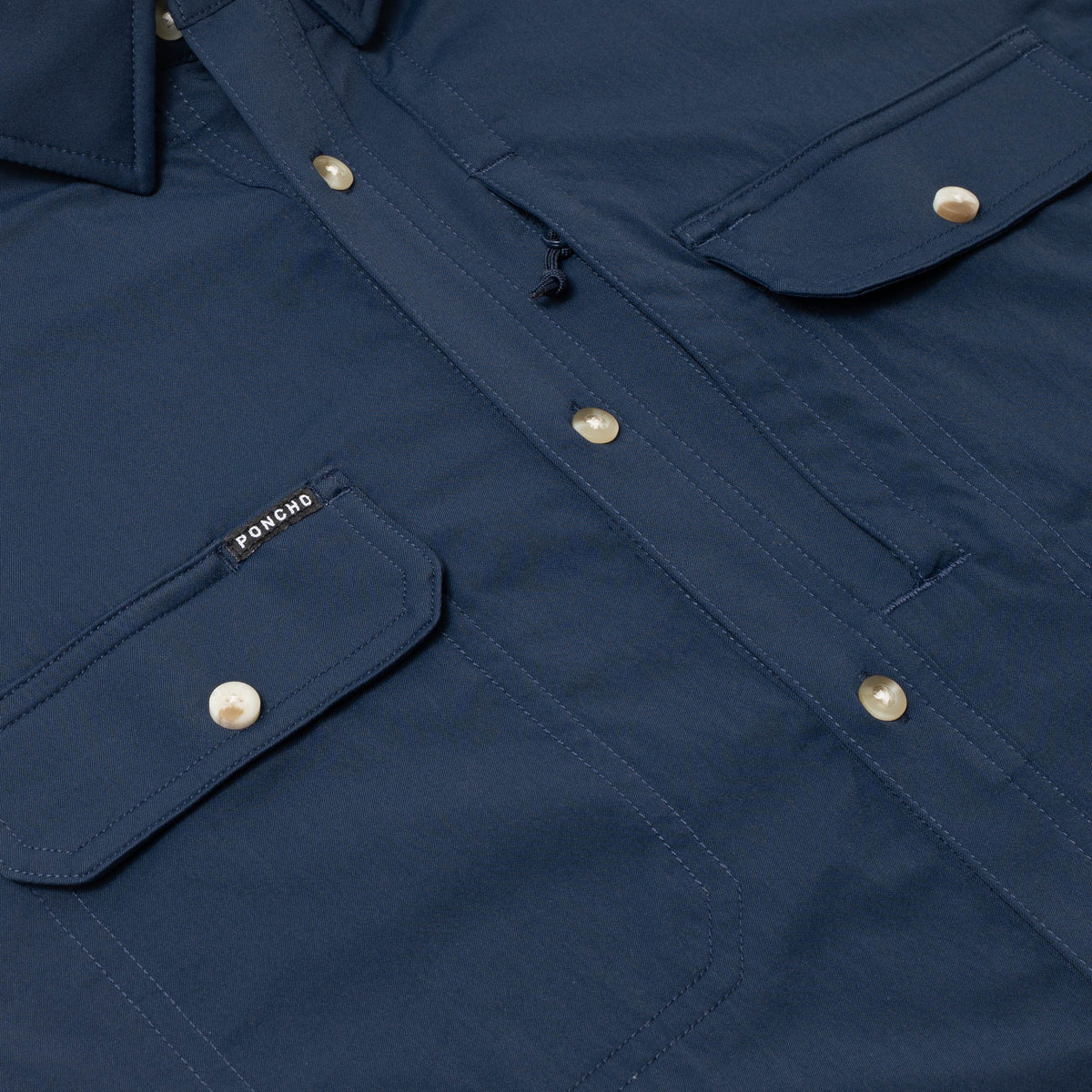 flyover photo of navy blue shirt