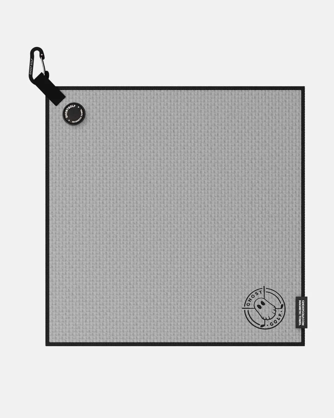 Product shot of Grey Ghost Golf Magnetic Greenside Towel with emblem logo near the bottom and carabiner clip at the top #color_grey