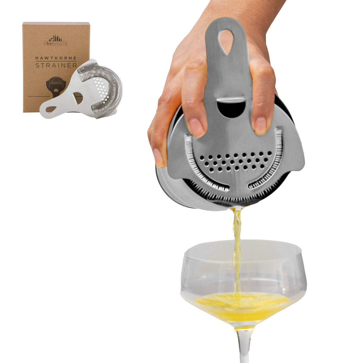 Stainless steel Hawthorne Strainer in use, pouring a cocktail, with its brown product box shown.