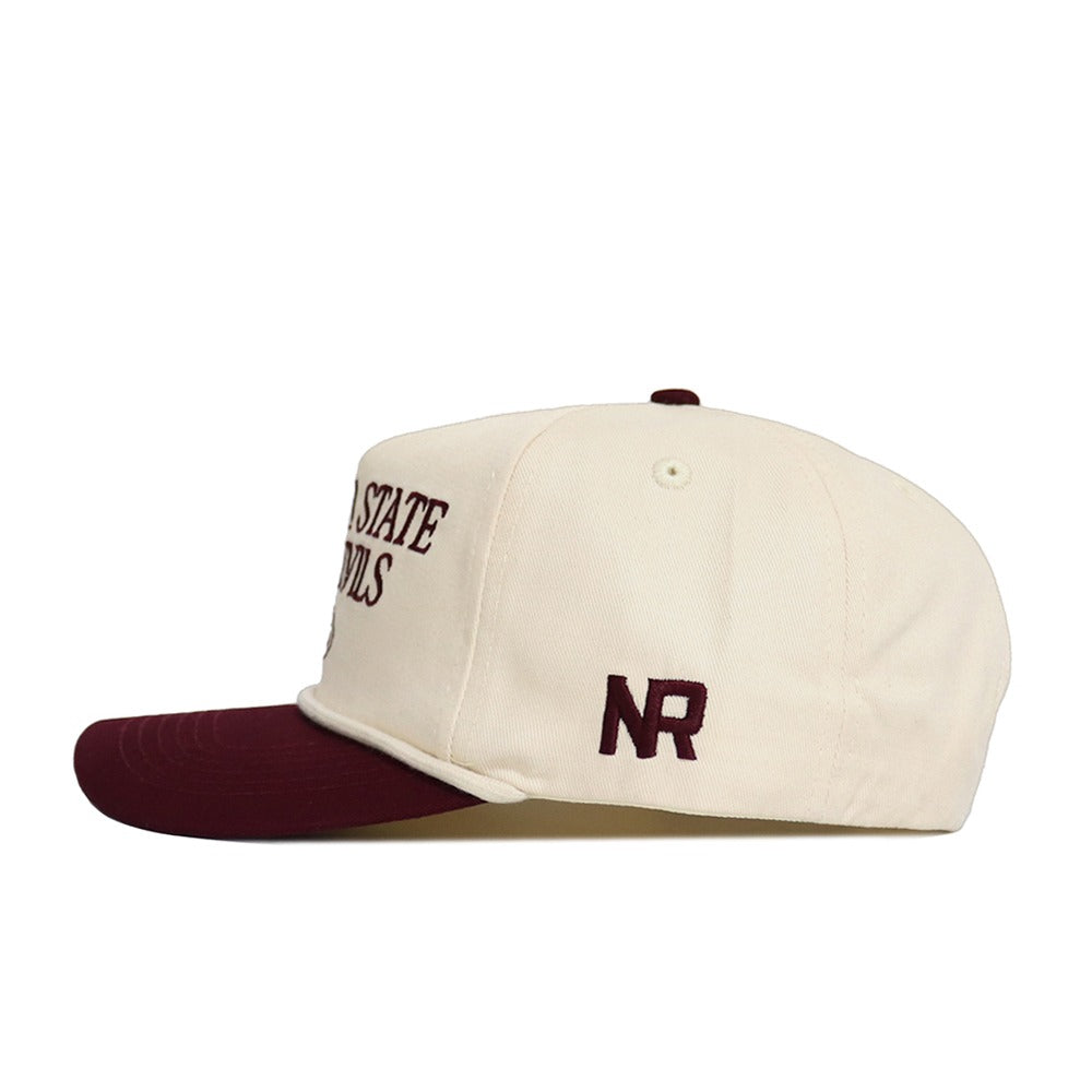 The No Rivals Arizona State Old School Hat (B2B) is a cream snapback with a burgundy brim. "NR" is embroidered on the left side and burgundy text appears on the front. Unstructured fit offers casual comfort.