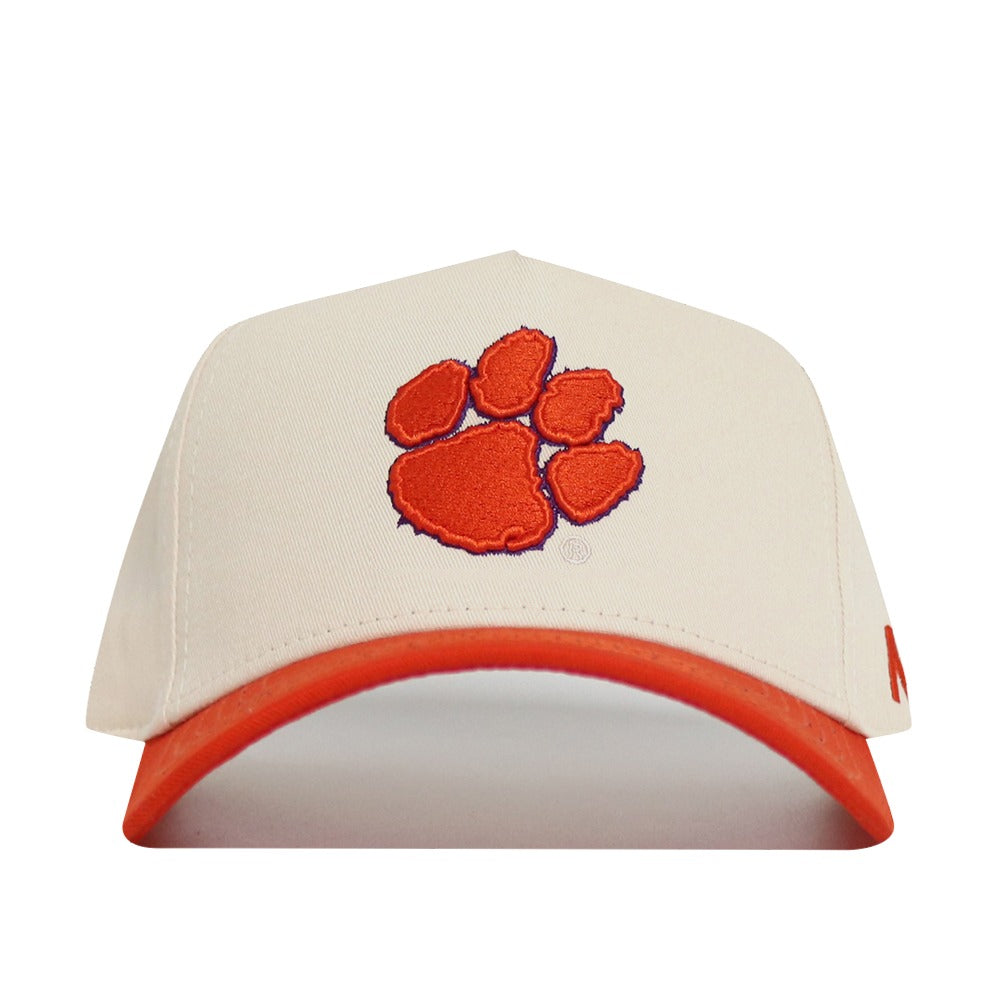 The No Rivals Classic Clemson Hat (B2B) is a cream cotton snapback with an orange paw print emblem and a matching orange curved brim—perfect for gameday style.