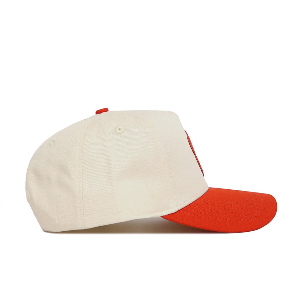 The No Rivals Classic Clemson Hat (B2B) is a snap back baseball cap made from high quality cotton, featuring a cream-colored crown and bright red brim, displayed side view on a white background.