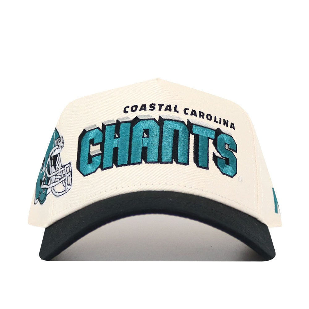 The No Rivals Coastal Carolina Alma Mater Hat - Classic (B2B) is a cream and black snapback baseball cap with COASTAL CAROLINA CHANTS in teal and black, the Chanticleer mascot on the left, made from high-quality cotton and officially licensed.