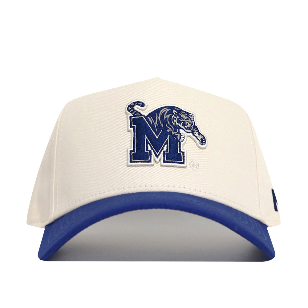 The Classic University of Memphis Hat by No Rivals features a white cotton cap with a blue brim, embroidered with a bold blue M and leaping tiger—perfect for gameday style.