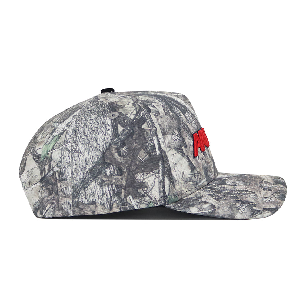 Side view of the Arizona Outland Hat by No Rivals, a camo flat-brim baseball cap made from premium cotton, featuring bold red AMD embroidery on the front.