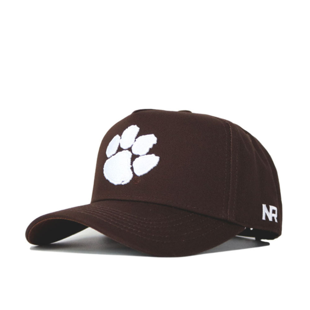 The Clemson Americano Hat is a dark brown cotton baseball cap with a large white paw print on the front and "NR" embroidered in white on the side.