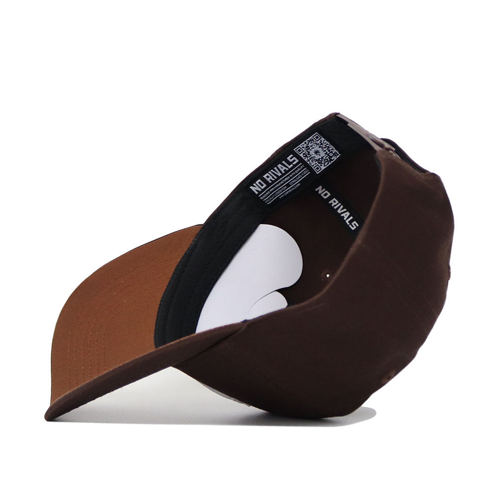 The Boise State Americano Hat is a brown snapback, flipped to display its black interior band with NO RIVALS text and a QR code label. Made from high-quality cotton for a structured fit.