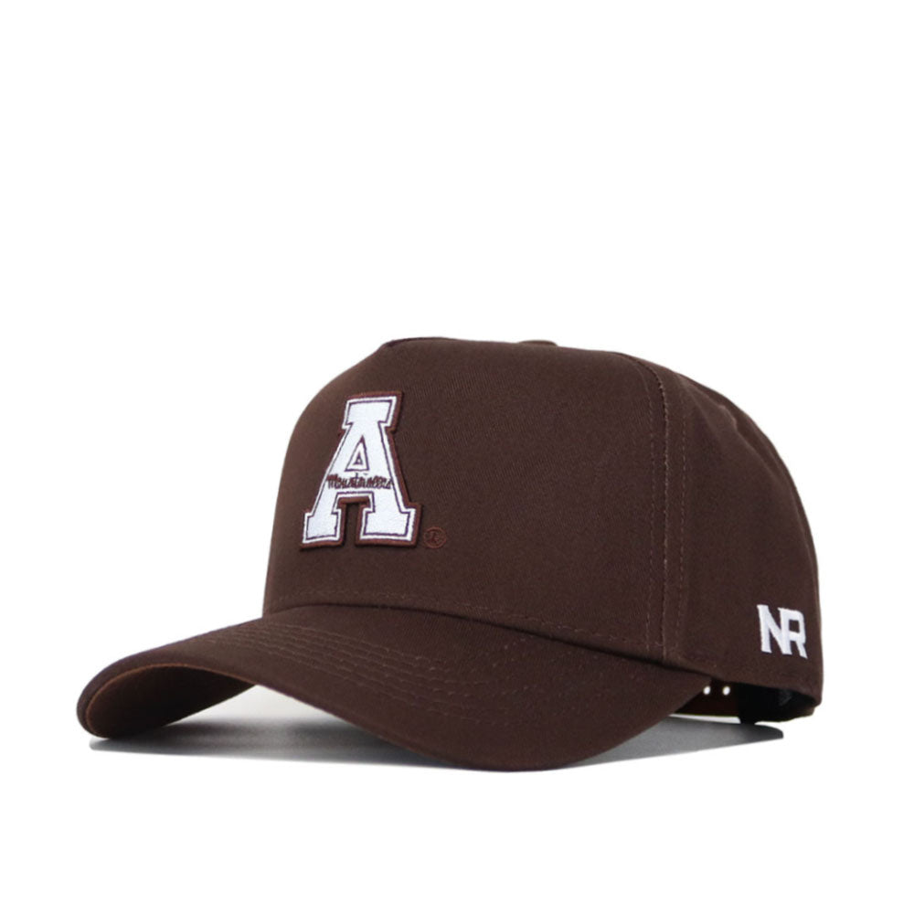 The App State Americano Hat is a brown cotton baseball cap with a white embroidered A on the front and NR on the side. It has a curved brim, structured fit, and adjustable strap at the back for comfort.