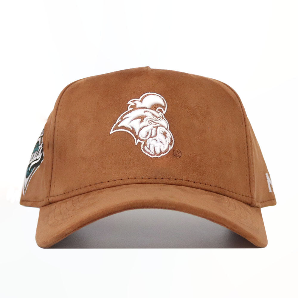 The No Rivals Coastal Carolina Heritage Hat is a brown suede snapback baseball cap with a white embroidered animal logo on the front and side patches, shown against a plain white background.