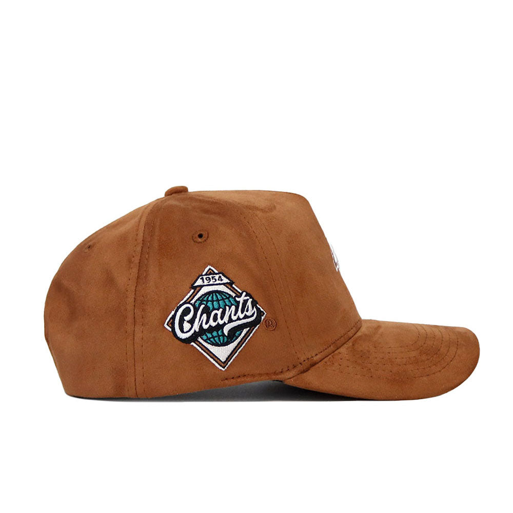 The No Rivals Coastal Carolina Heritage Hat is a brown snapback baseball cap with a diamond patch on the left panel, displaying "1954 Chants" in white, teal, and black embroidery above the brim.