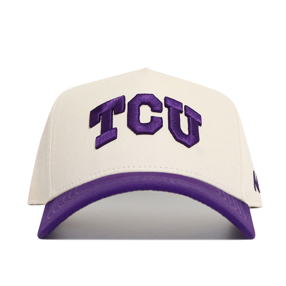The No Rivals Classic TCU Hat (B2B) is a cream snapback with bold purple TCU lettering on the front and a matching purple brim—officially licensed and perfect for your gameday fit.