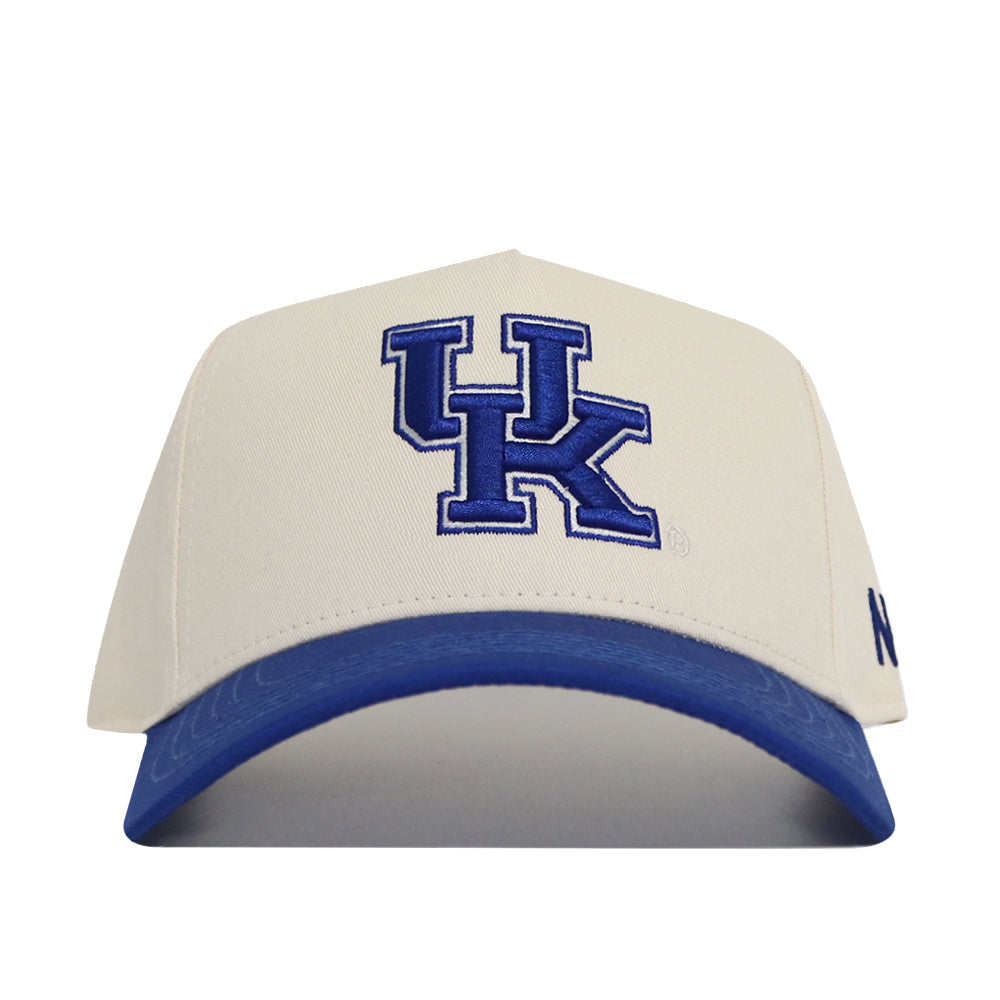 The Classic University of Kentucky Hat (B2B) by No Rivals is a white snapback cap with a blue brim and large embroidered blue UK logo, offering an officially licensed, structured fit for Wildcats fans.