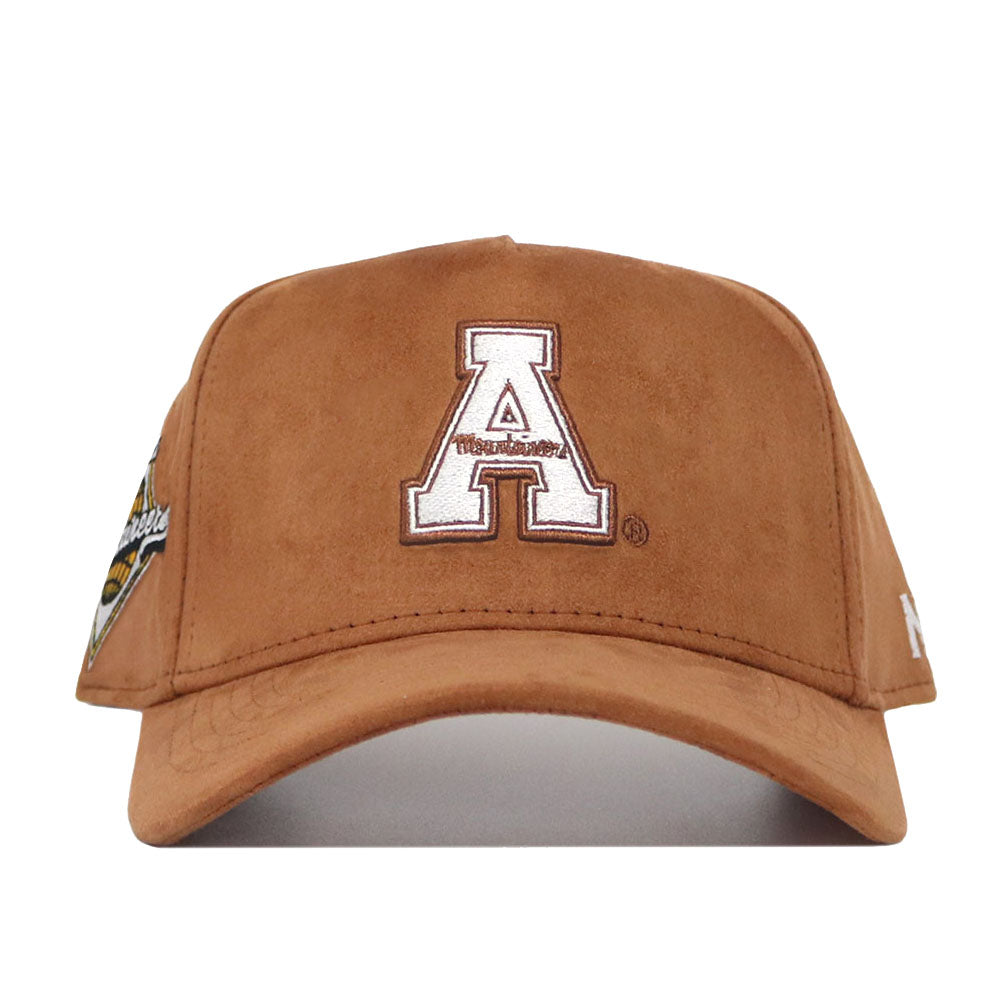 The App State Heritage Hat by No Rivals is a brown, structured baseball cap with a large white embroidered A and small front text. It features left-side patches and the New Era logo on the right, and is officially licensed.