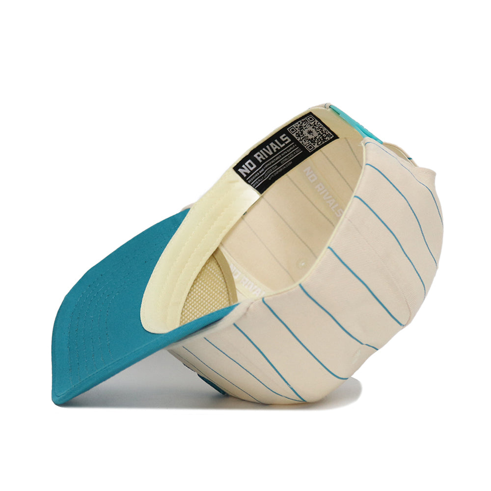 The Coastal Carolina Pinstripe Hat by No Rivals is a teal and cream baseball cap with blue pinstripes, mesh lining, a curved brim, and snapback closure for adjustable comfort. Interior label reads NO RIVALS. Crafted from high-quality cotton.