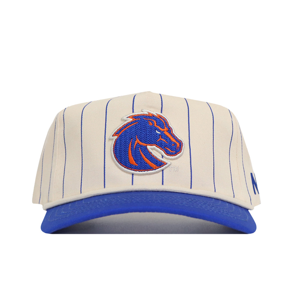 The No Rivals Boise State Pinstripe Hat features a cream base with thin blue stripes, a blue brim, and an embroidered blue and orange bronco head logo. Made from high-quality cotton, it offers an adjustable snapback for the perfect fit.
