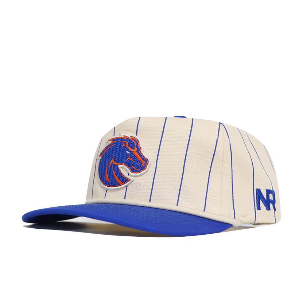 The No Rivals Boise State Pinstripe Hat is a cream cap with blue pinstripes, an embroidered blue and orange horse logo on the front, NR initials on the side, a solid blue brim, and a snap back closure for comfort.