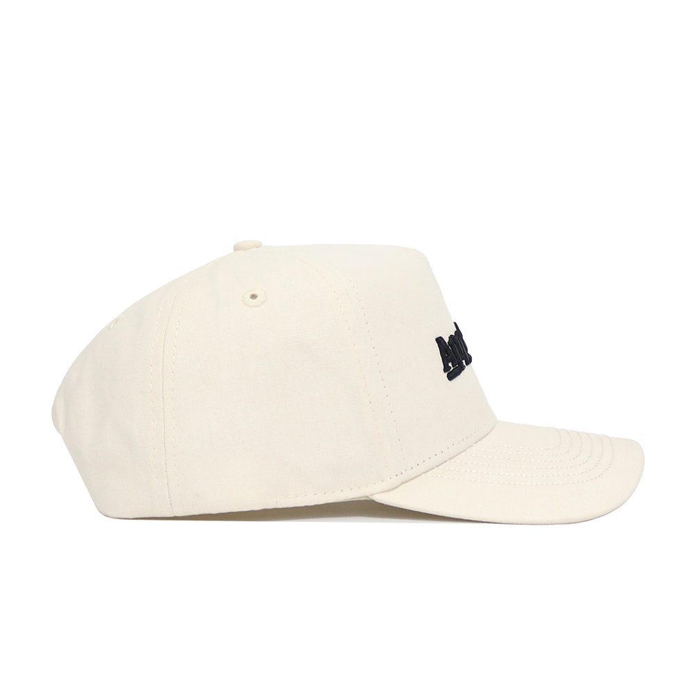 The No Rivals App State Sideline Hat is an off-white, structured baseball cap with side ventilation holes, black embroidered front text, and high-quality cotton construction.