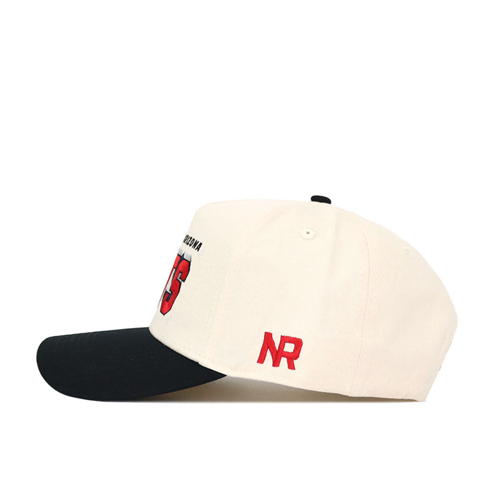 The Arizona Alma Mater Hat - Classic by No Rivals features a cream snapback design with a black brim, red embroidered NR on the side, and a red and black logo on the front. Made from high-quality cotton for a structured fit.