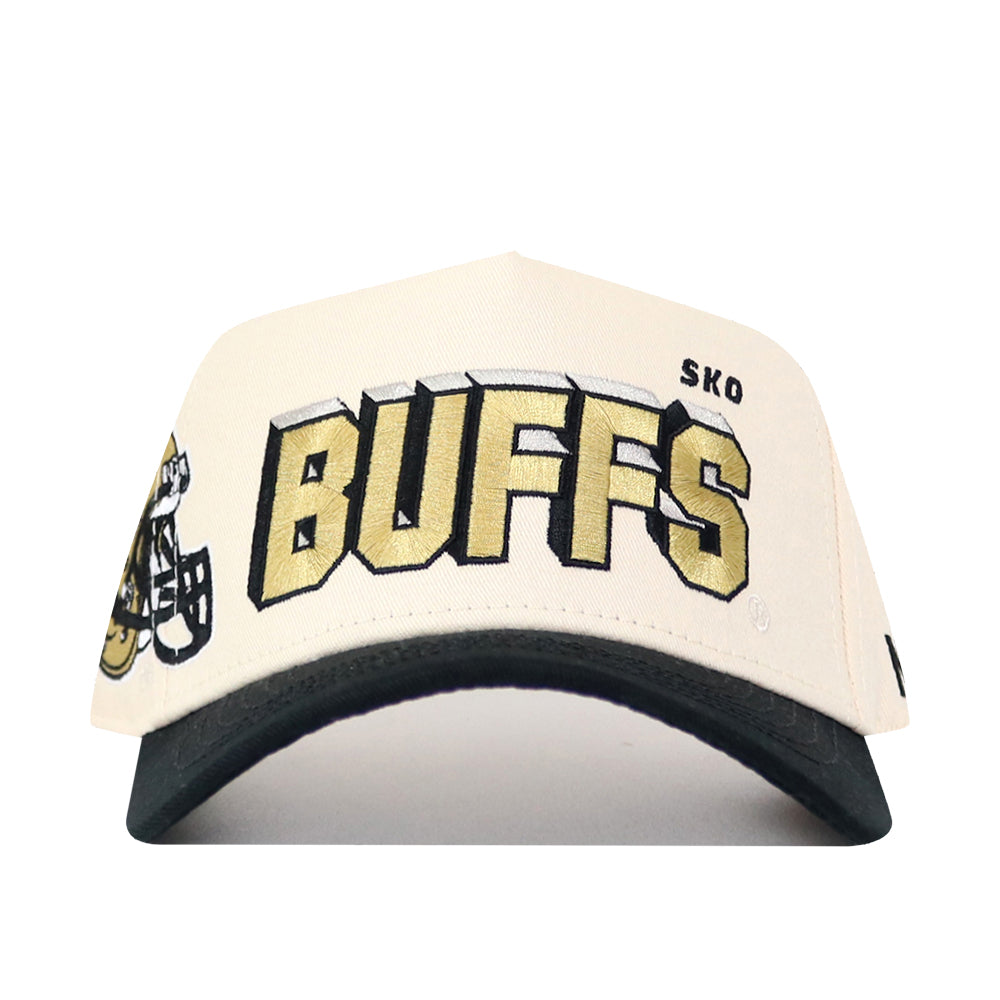The Colorado Alma Mater Hat is a white and black snapback featuring "BUFFS" in bold gold and black letters, "SKO" above, and a football helmet graphic on the left side. It offers a structured fit in high-quality cotton.