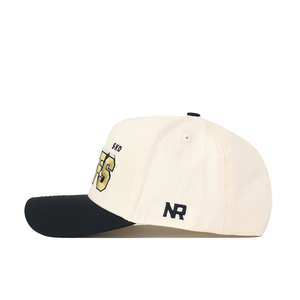 The Colorado Alma Mater Hat is a cream snapback with a black brim, featuring embroidered text and numbers on the front and side, NR stitched above the ear, and made from high quality cotton for lasting comfort.