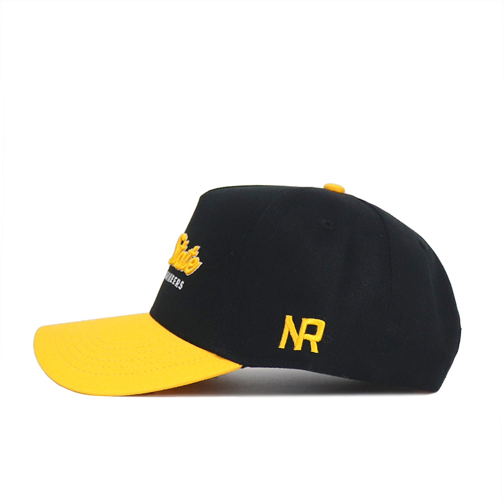 The No Rivals App State Retro Script Hat is a black snapback baseball cap with a yellow brim and yellow embroidered NR text on the side, made from high-quality cotton, shown in profile against a white background.