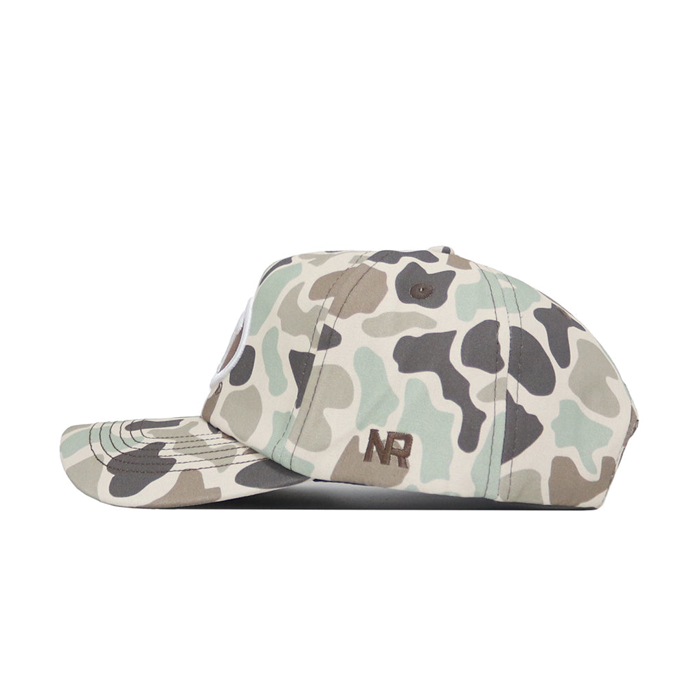 The BYU Huntsman Hat by No Rivals is a 5-panel duck camo snapback in green, beige, and gray, with "NR" embroidered in brown on the side. Shown from a side view against a white background.