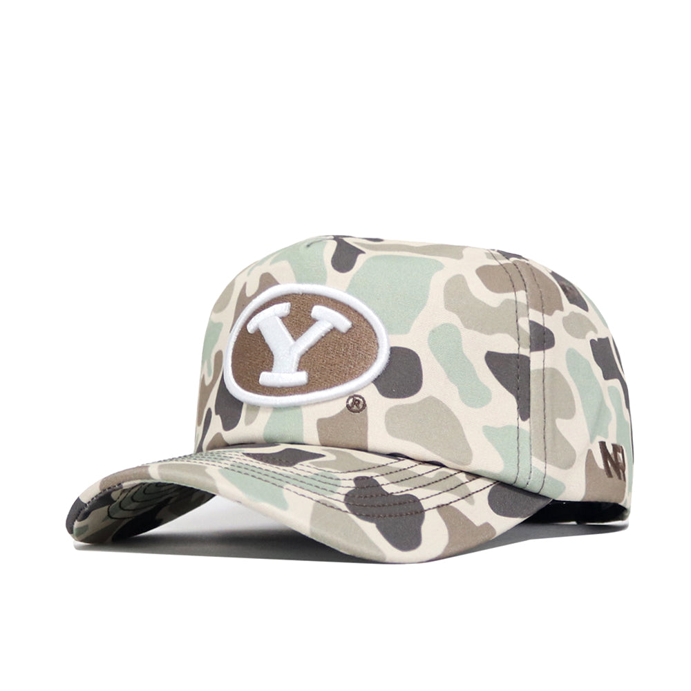 The No Rivals BYU Huntsman Hat is a duck camo 5-panel hat with a white and brown Y logo on the front, MP initials on the side, and a snapback closure for comfort.