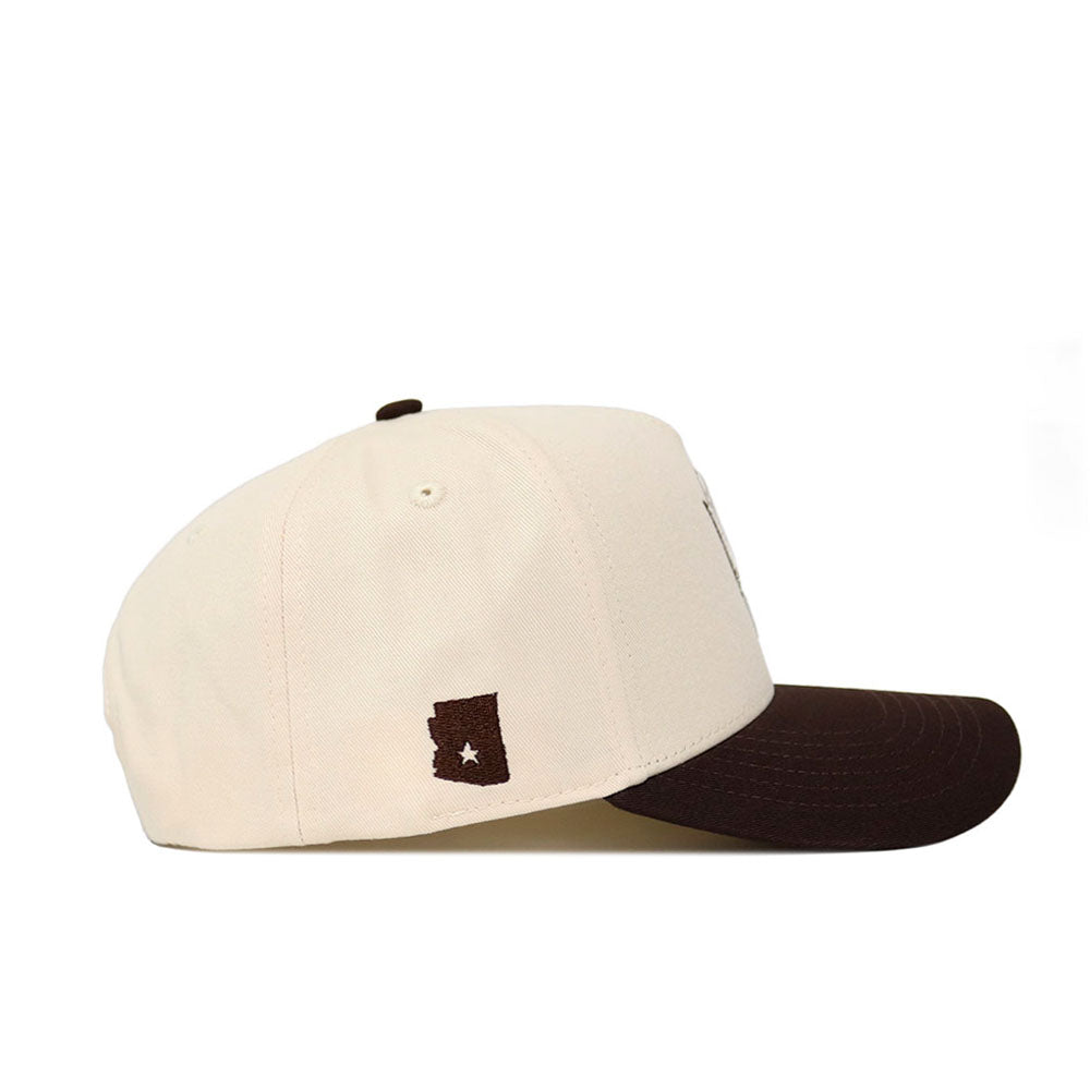 The No Rivals Arizona State Espresso Hat features a cream crown, dark brown brim, premium cotton build, and an outlined brown Arizona with a white star on the side. Includes an adjustable snap back for a custom fit.