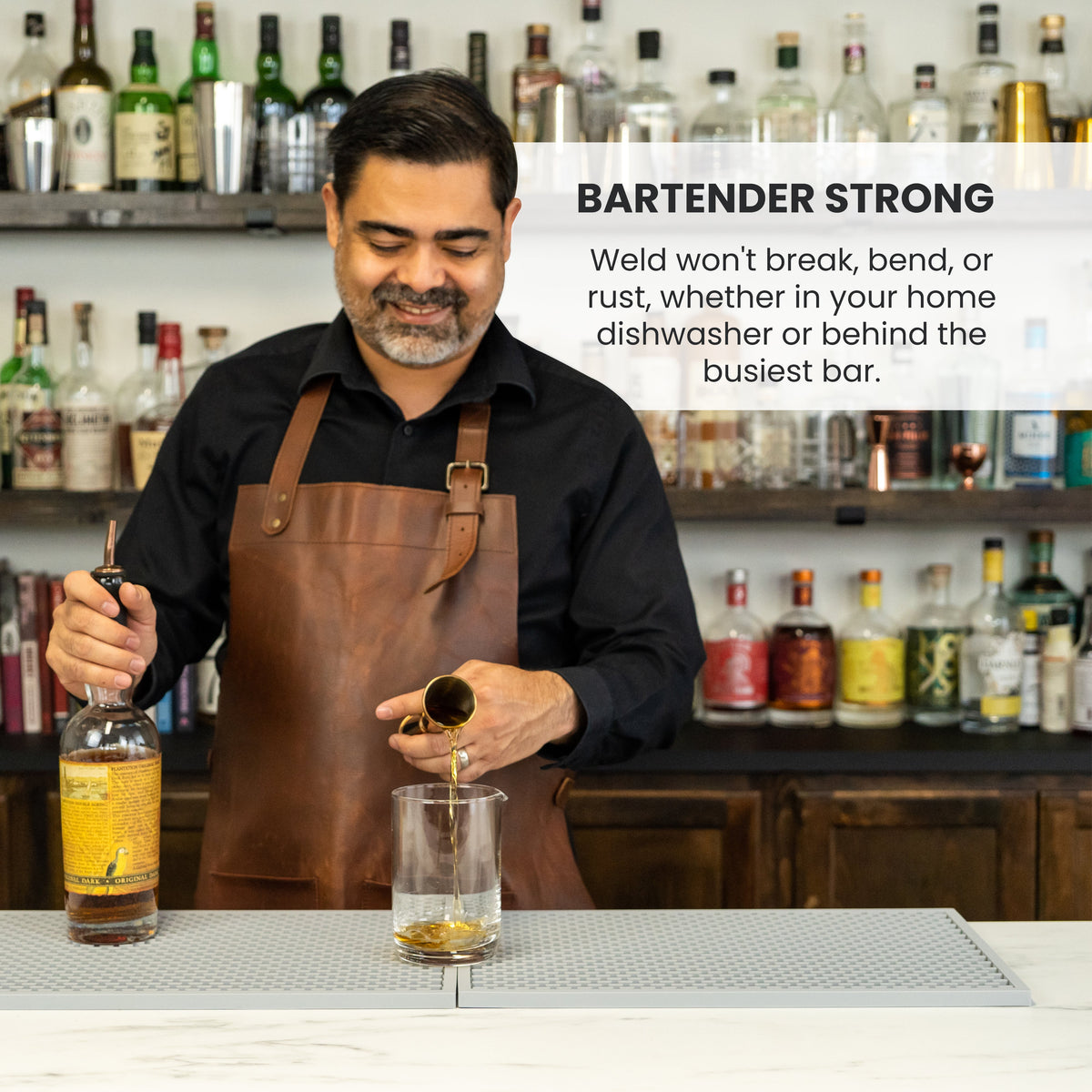 Infographic showing a bartender using a Japanese jigger, highlighting its strength and durability (details in description).