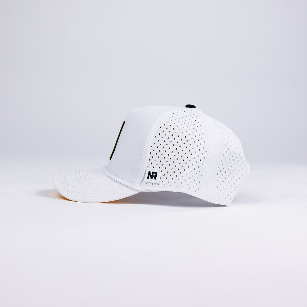 A white perforated Appalachian State Gameday Hat by No Rivals is shown in side view on a plain background, featuring a small black and white NR logo tag near the brim—an essential upgrade to your gameday fit.