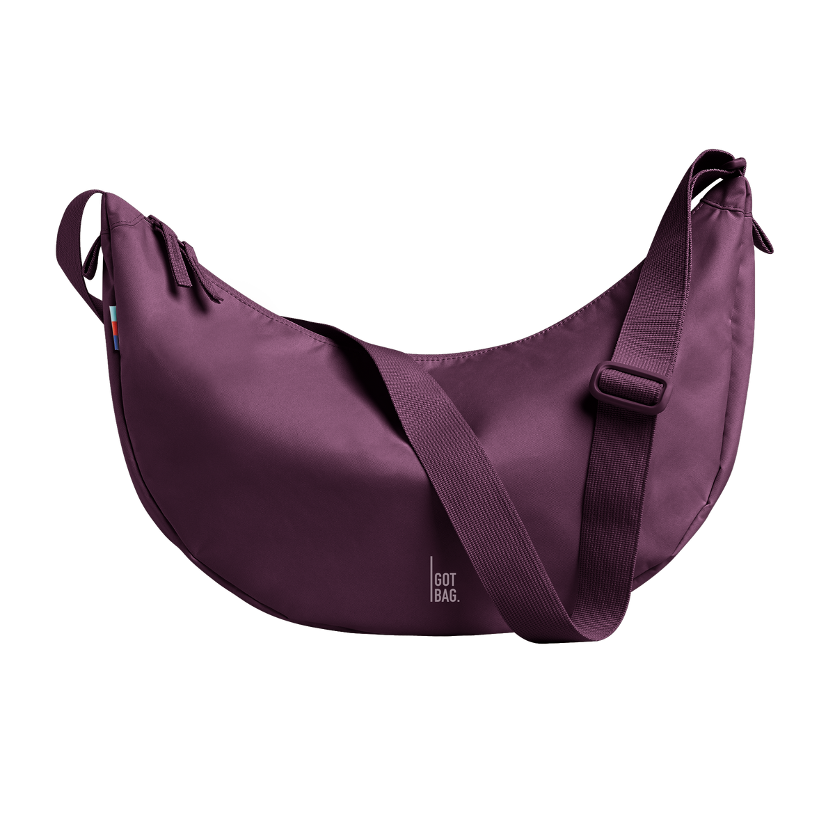 MOON BAG LARGE bag in favia (Warm Dark Purple / Plum), studio shot, front view.